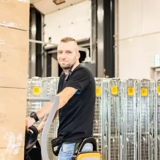 Logistiek Kierowca wózka wysokiego składowania